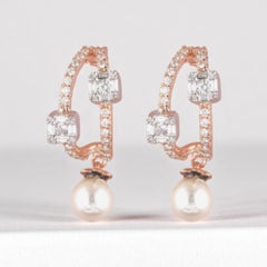 Boucles d'oreilles Huggie Baguette en or massif 14K (certifié)