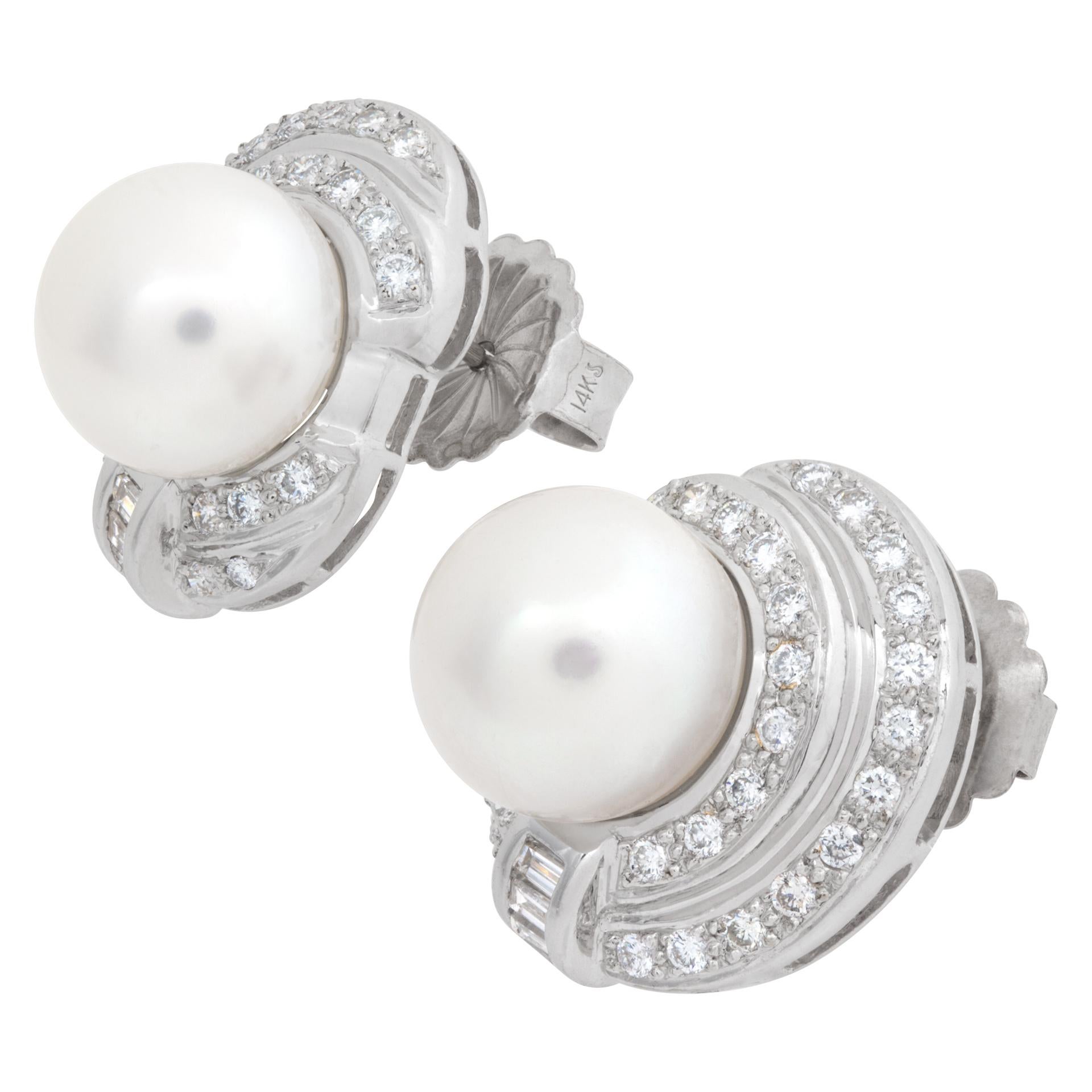 Pearl earrings in 14k white gold with 11mm pearls silver pink in color and approximately 0.72 carats in diamonds. Earring dimensions 16mm x 20mm.