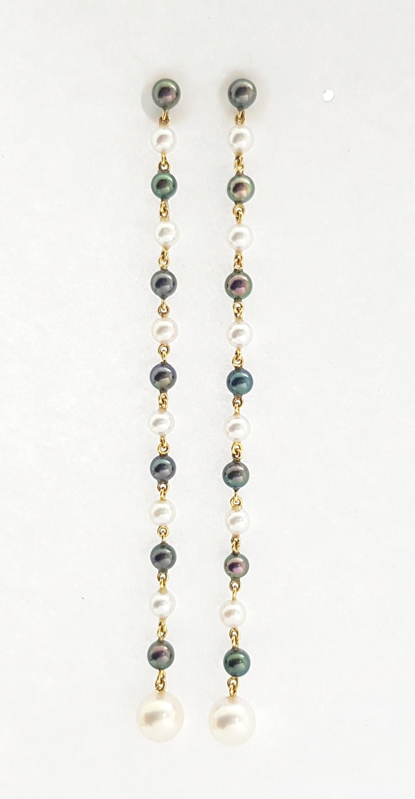 Contemporary Pearl Earrings set in 18K Gold Settings For Sale