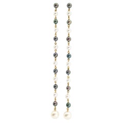 Pearl Earrings set in 18K Gold Settings