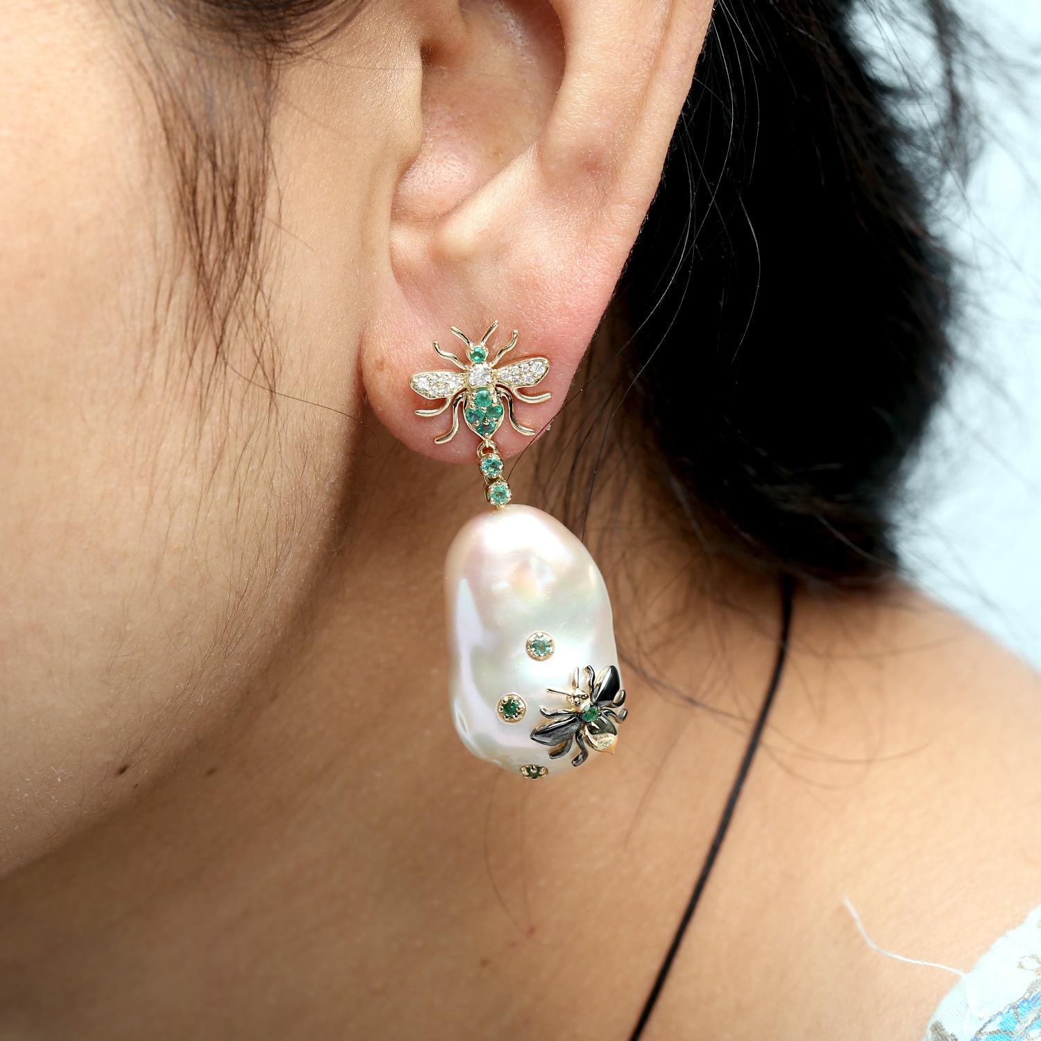 18KT:7.016g,D:0.24ct, EMERALD:0.78ct,PEARL:72.55ct 45X16 MM
