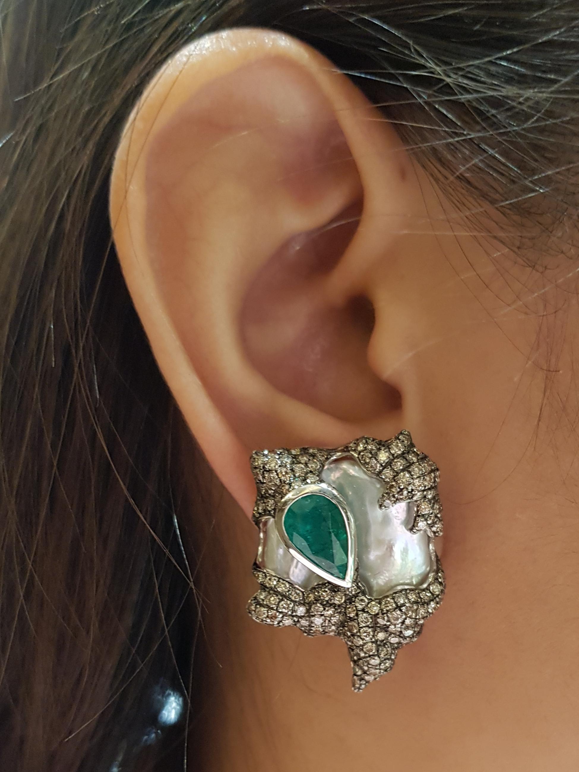 Pearl, Emerald 4.27 carats and Brown Diamond 4.33 carats Earrings set in 18 Karat White Gold Settings

Width:  2.5 cm 
Length:  3.5 cm
Total Weight: 31.23 grams

