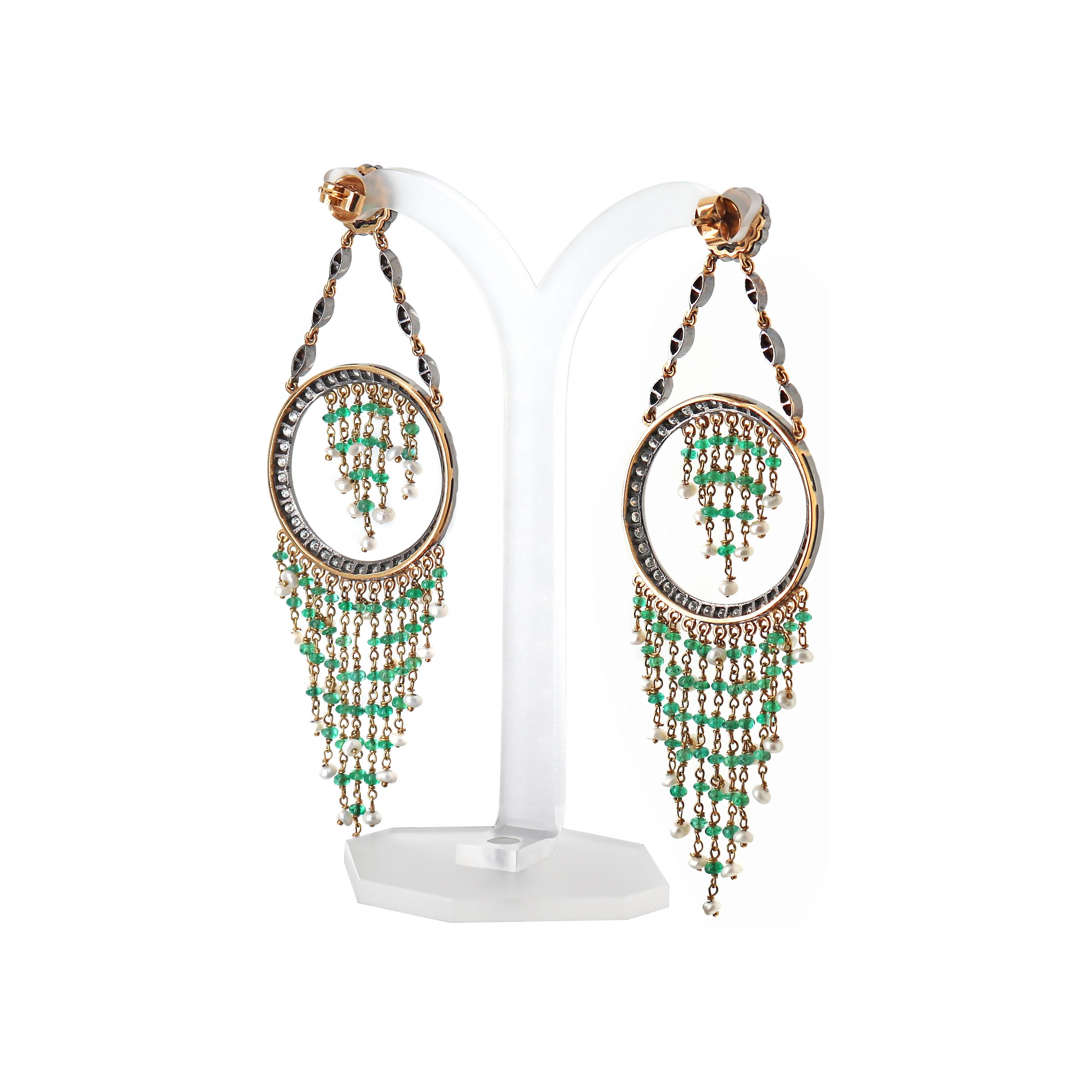 Beautiful hand made beaded chandelier earrings crafted from 18 karat yellow and white gold, featuring cascade tassel style emerald beads and baroque culture pearls. The edgings are hanging from a circle set with 40 round brilliant cut diamonds,