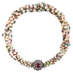 Collana di perle, smeraldo, zaffiro, rubino e spinello
