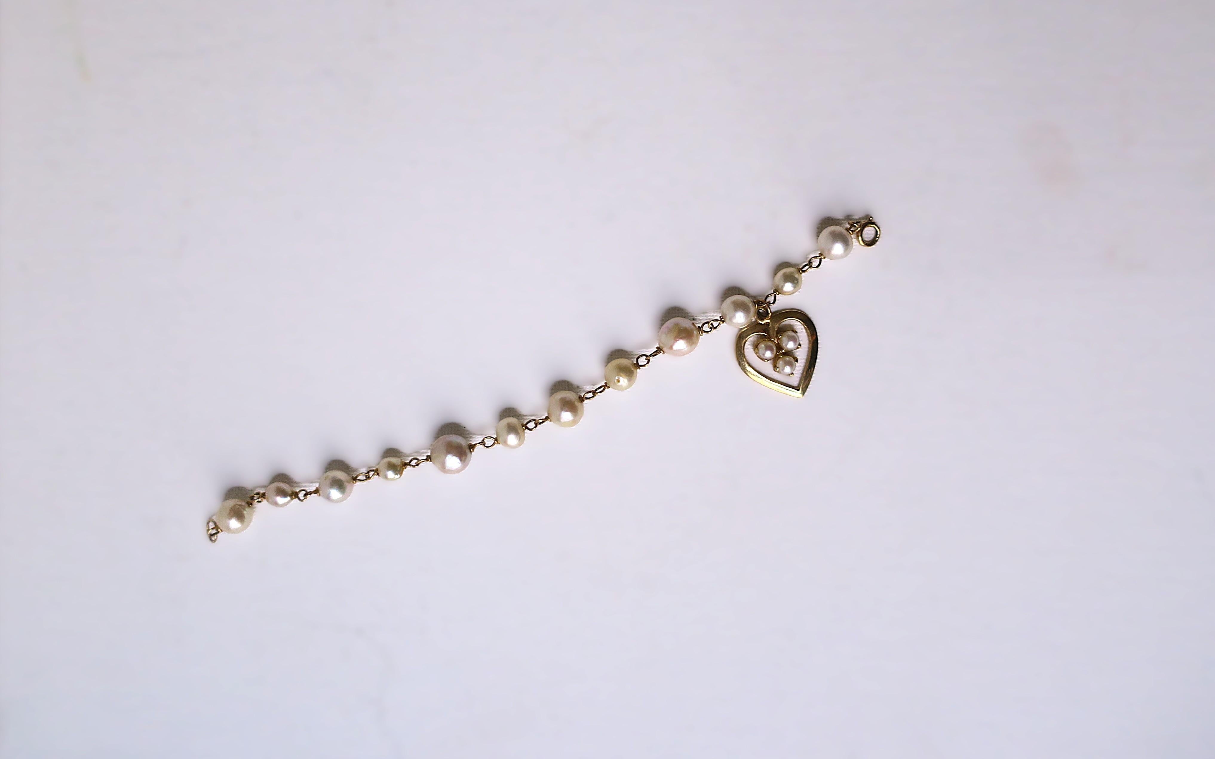 Bracciale con perle e cuore in oro 14 carati in vendita 5