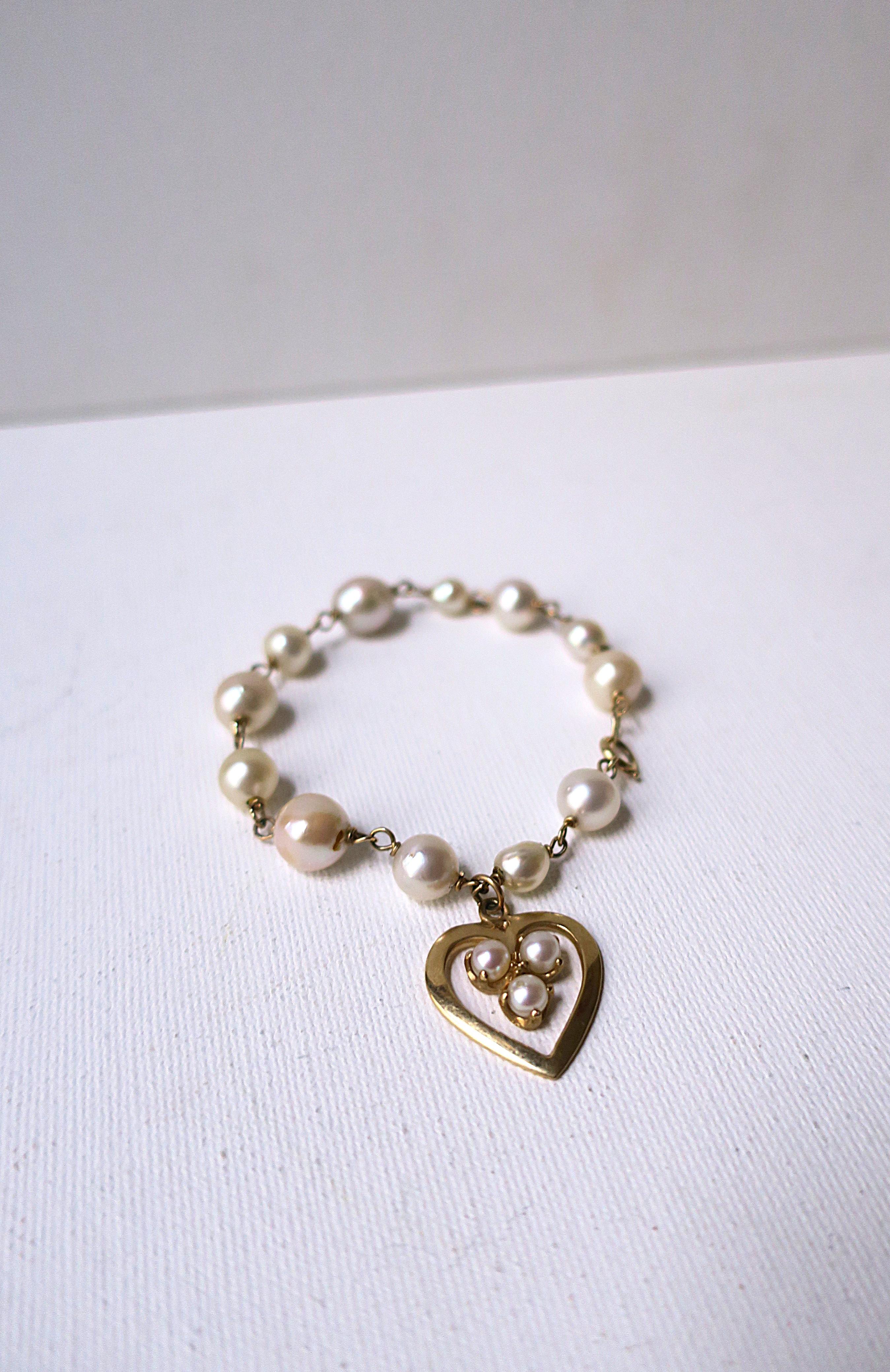 Bracciale con perle e cuore in oro 14 carati in vendita 1