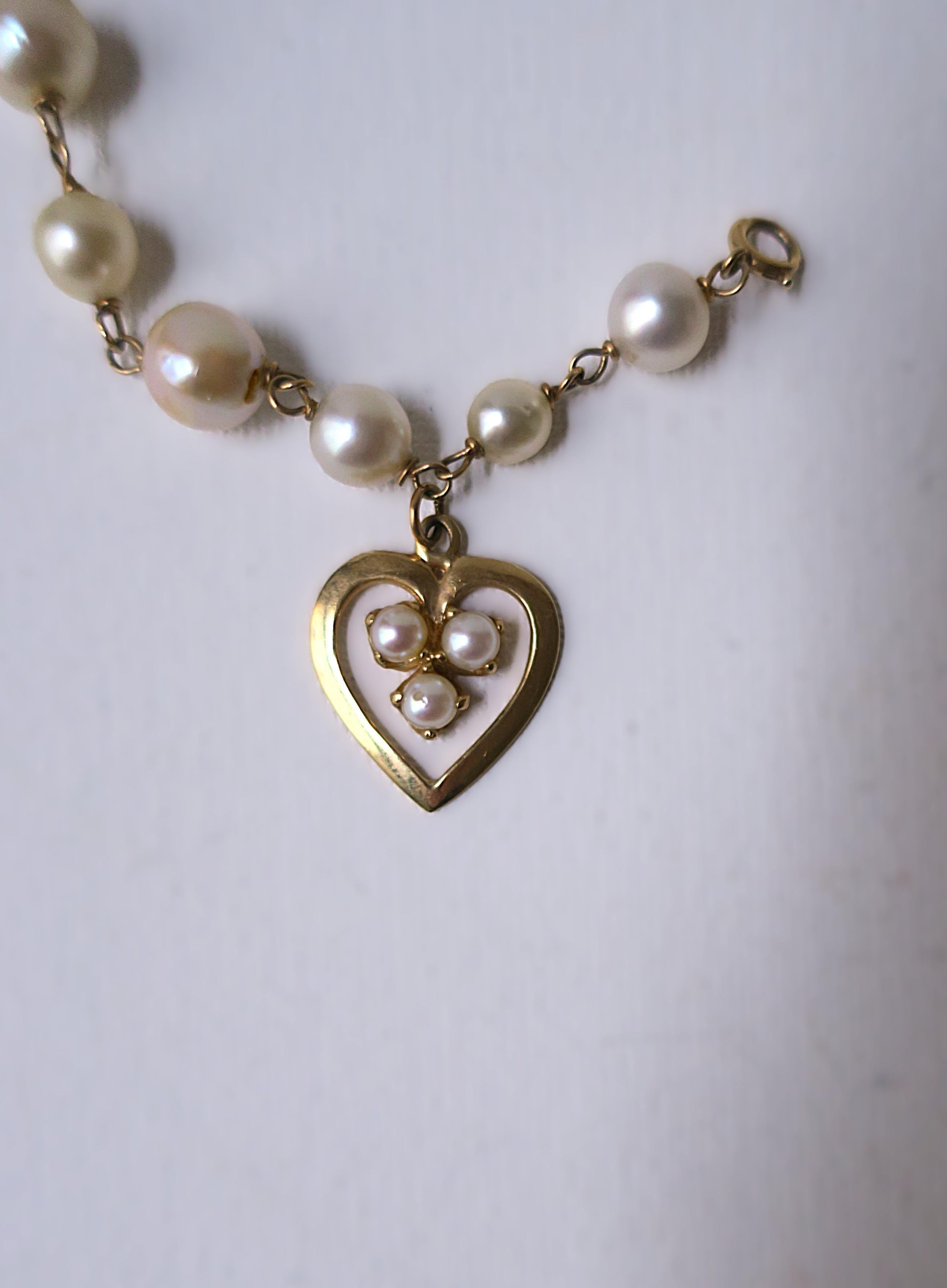 Bracciale con perle e cuore in oro 14 carati in vendita 2