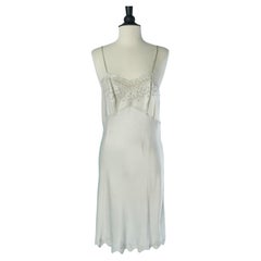 Pearl grey silk slip dress with hand made embroideries Circa 1930
s