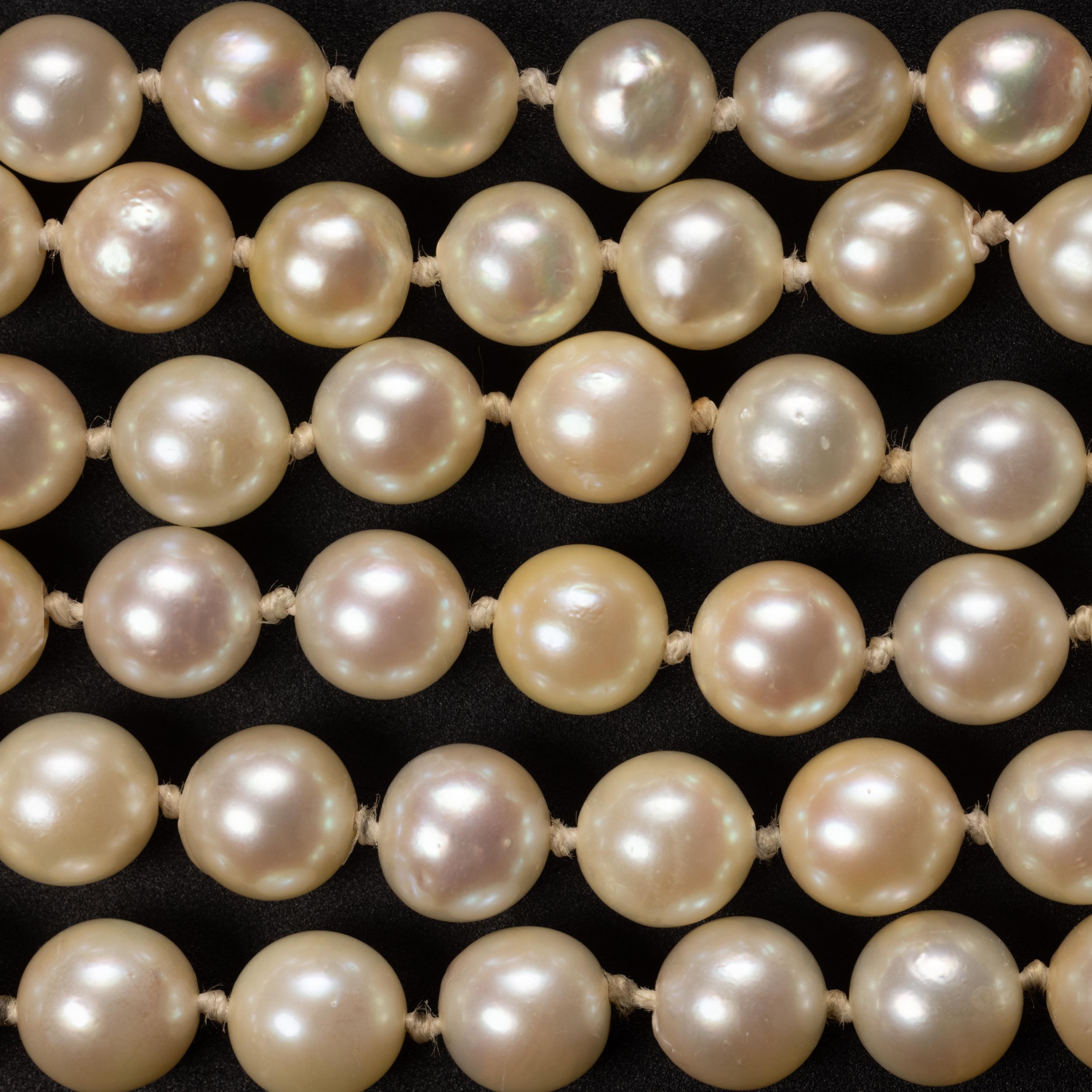 Retro Pearl Necklace Lariat with Rubies Circa 1950s