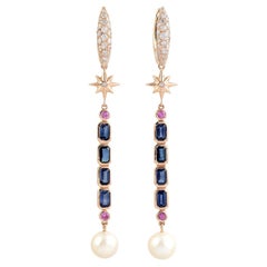 Longues boucles d'oreilles en or rose 18 carats avec saphirs et diamants