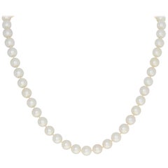 Pearl Necklace, 14 Karat Gold Knotted Strand with Diamond Clasp .75 Carat