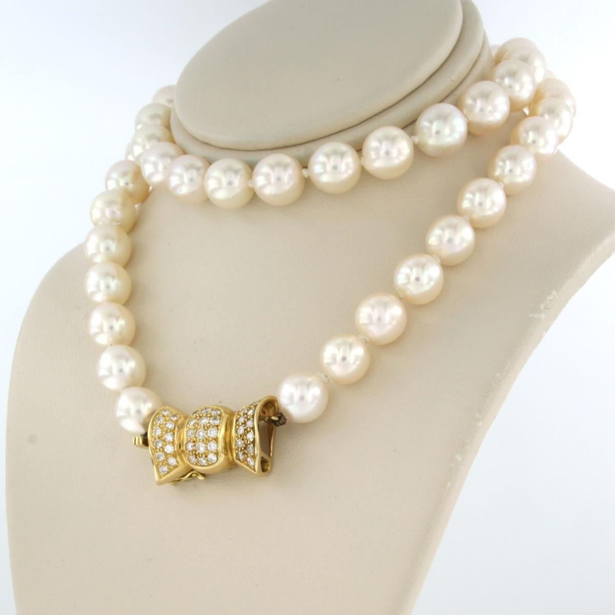 Brilliant Cut Pearl Necklace and gold lock with diamonds 18k yellow gold For Sale