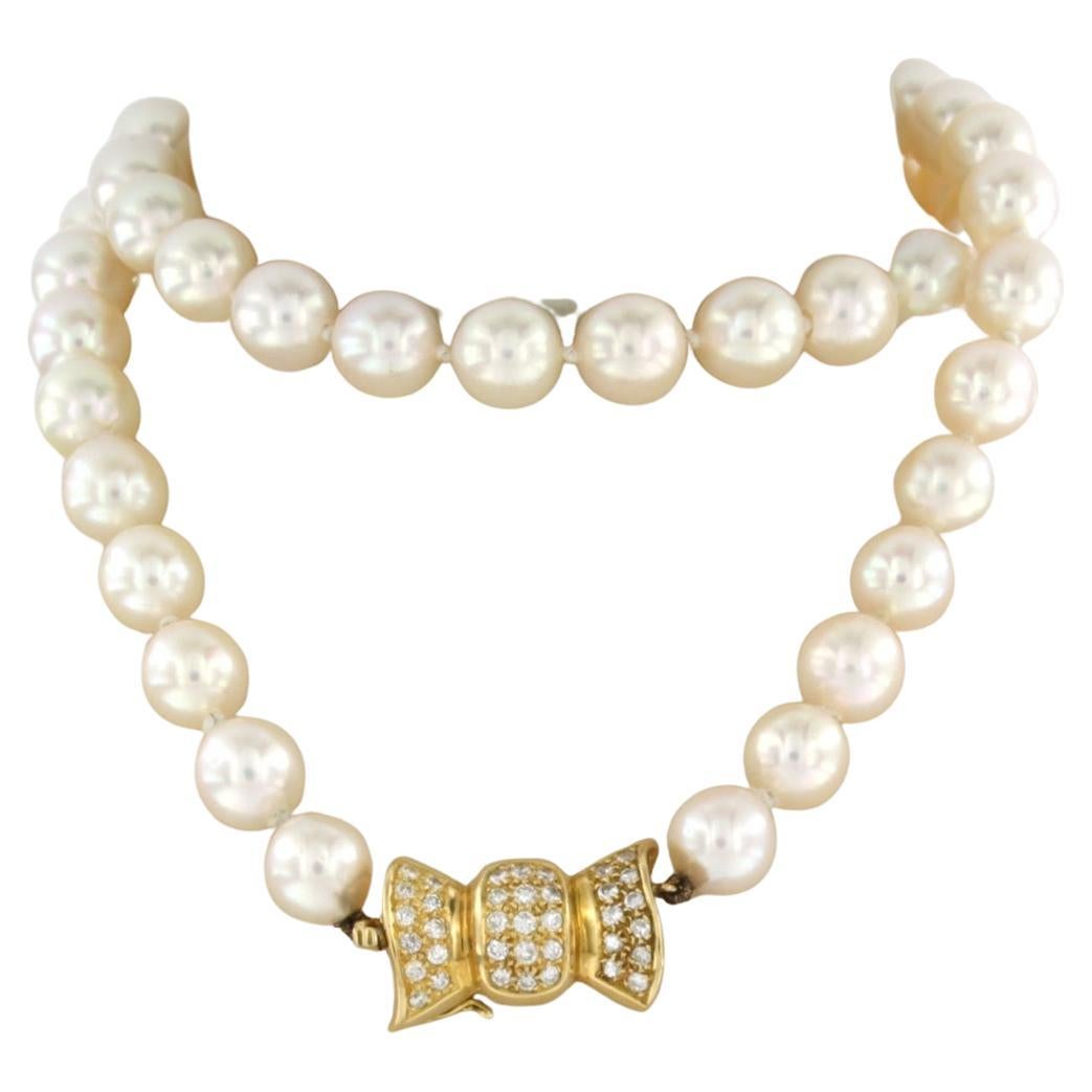 Pearl Necklace and gold lock with diamonds 18k yellow gold For Sale