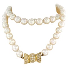 Pearl Necklace and gold lock with diamonds 18k yellow gold