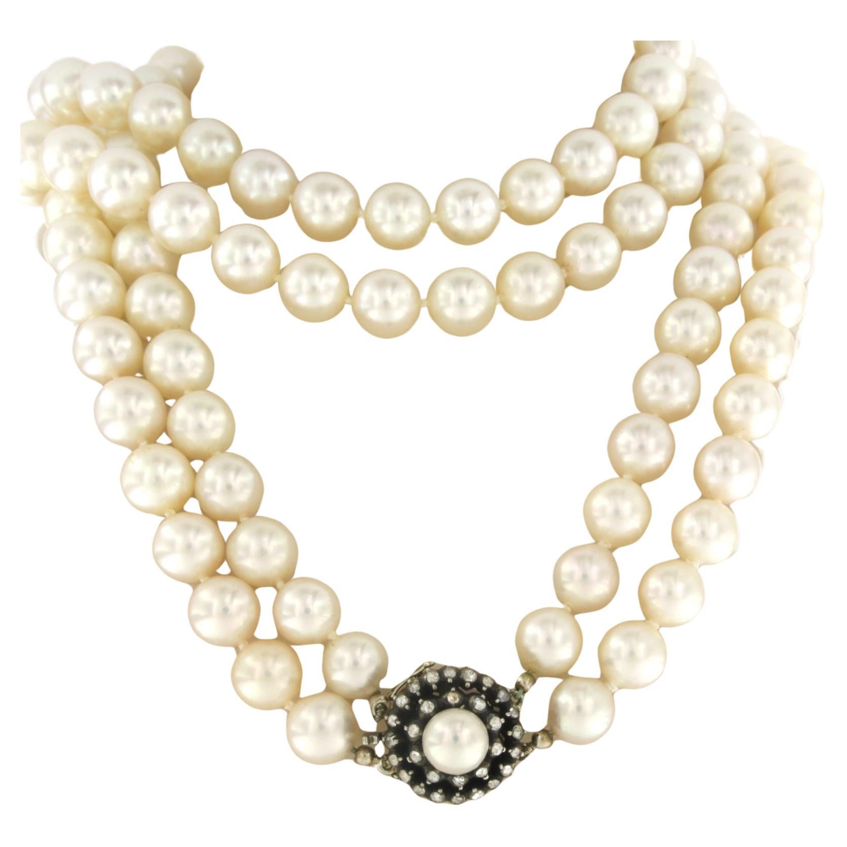 Pearl necklace and lock with pearl and diamonds up to.0.40ct 14k gold and silver For Sale
