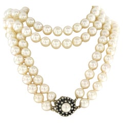 Pearl necklace and lock with pearl and diamonds up to.0.40ct 14k gold and silver