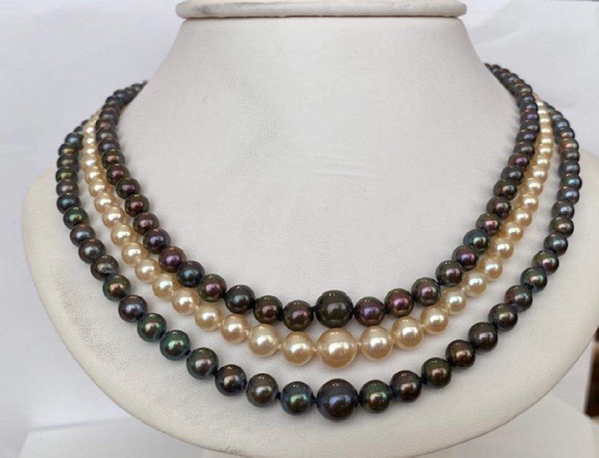 Offered is a vintage  beautiful  pearl necklace with gold clasp. The necklace is decorated with 3 rows of natural freshwater cultured pearls. Pearls of great regularity and very fine luster, almost all round with few natural growth marks. The gold