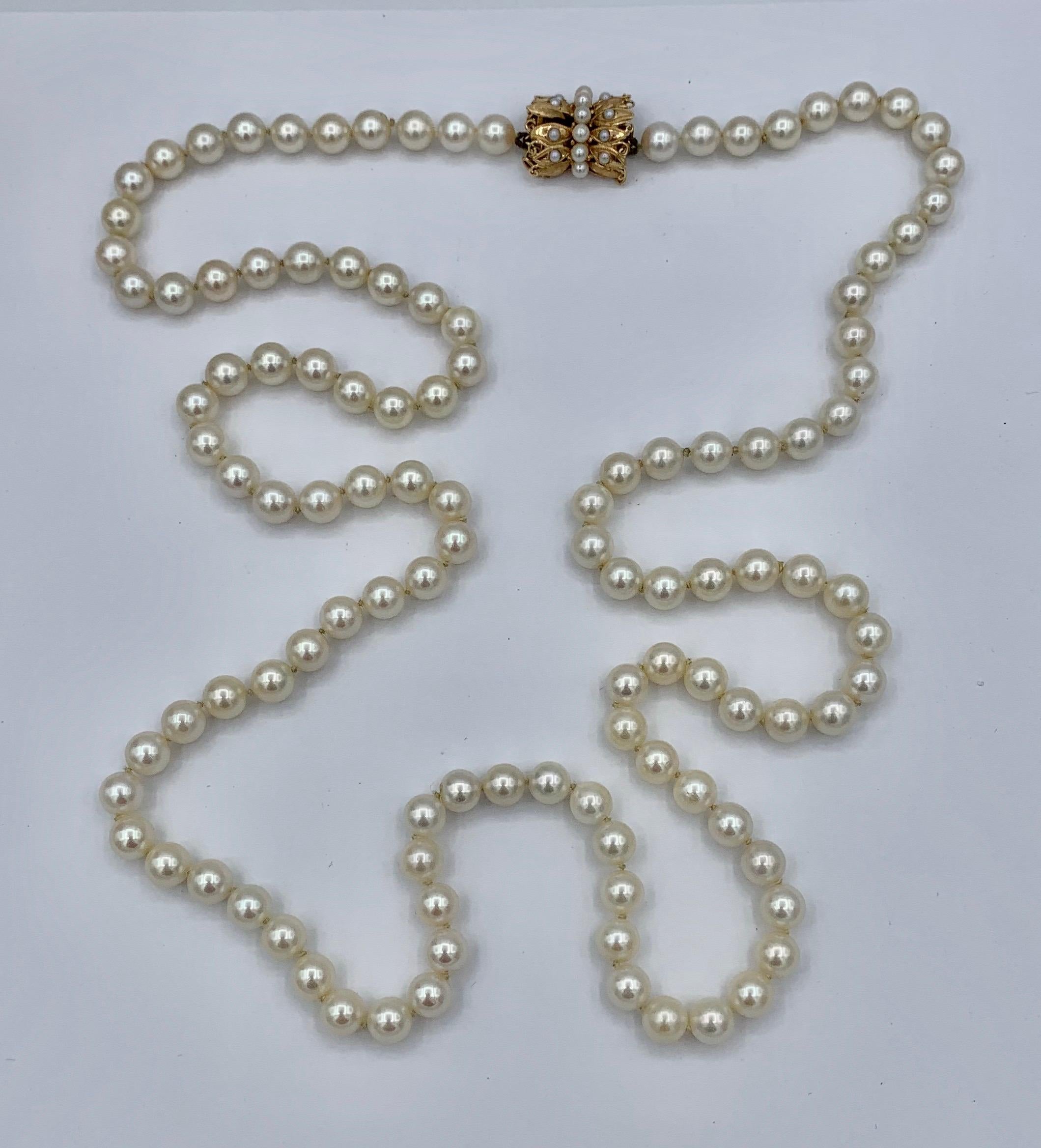 Women's or Men's Pearl Necklace Retro 14 Karat Gold Clasp Ambassador Galbraith Estate For Sale