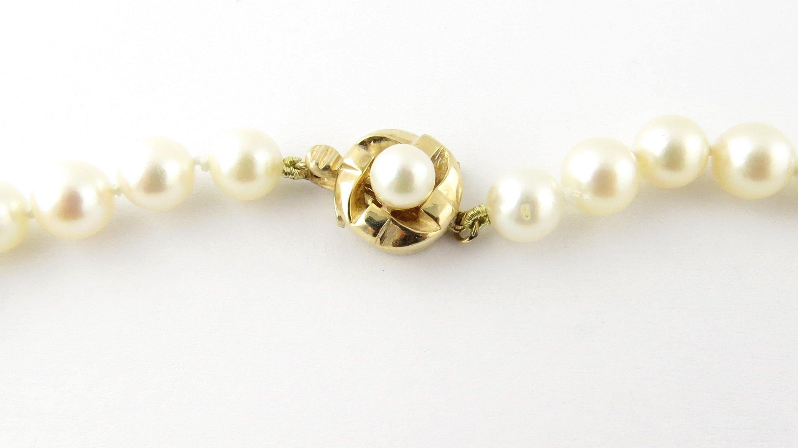 Vintage Pearl Necklace with 14 Karat Yellow Gold Closure
This elegant strand of 61 pink/white pearls features a lovely 14K yellow gold and pearl closure. Each pearl measures 6.5 mm - 7 mm. *Some minor imperfections noted to a few pearls; Lustre is