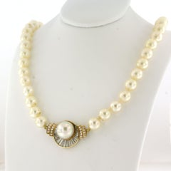 Pearl necklace with diamonds up to 2.00ct 18k gold and silver
