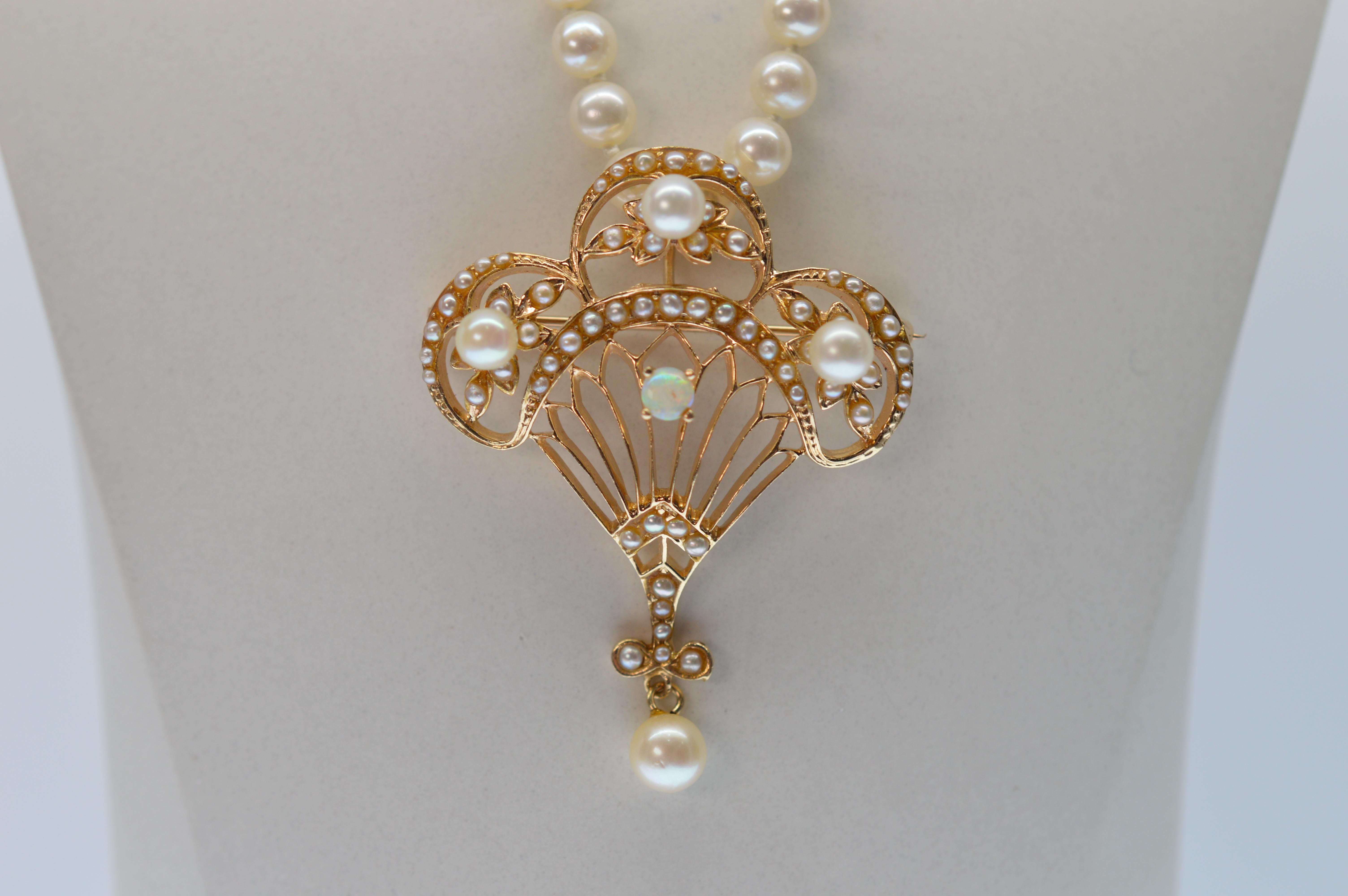 A fancy Antique Style 14k Yellow Gold Pendant / Brooch adorns this twenty four inch 5.5 x 5mm AAA Akoya Pearl Strand creating this stunning yet versatile Necklace that will surely garner compliments. The Pendant of brilliant 14k Gold is adorned with