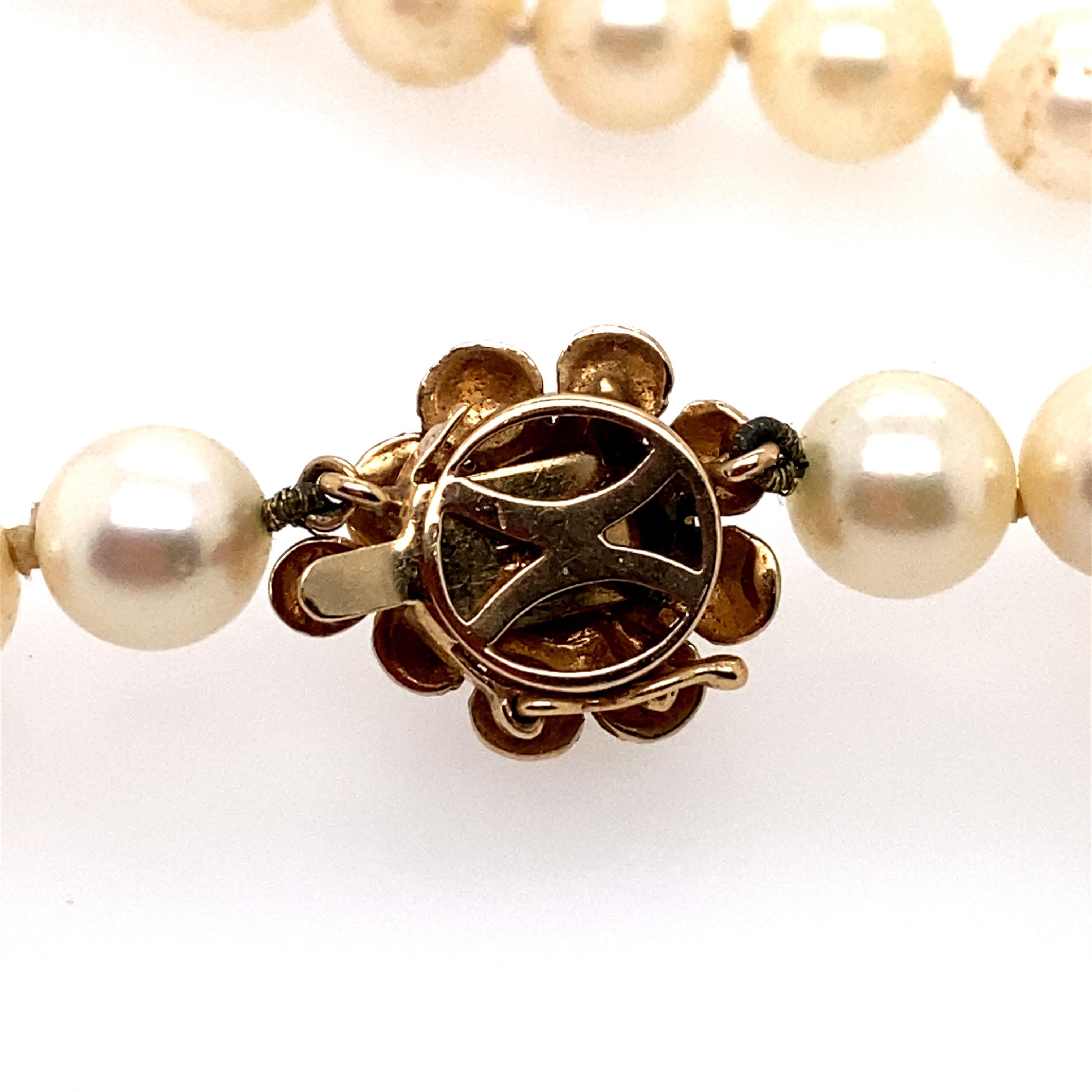 Perlenkette mit Blumenverschluss aus 14 Karat Gold für Damen oder Herren