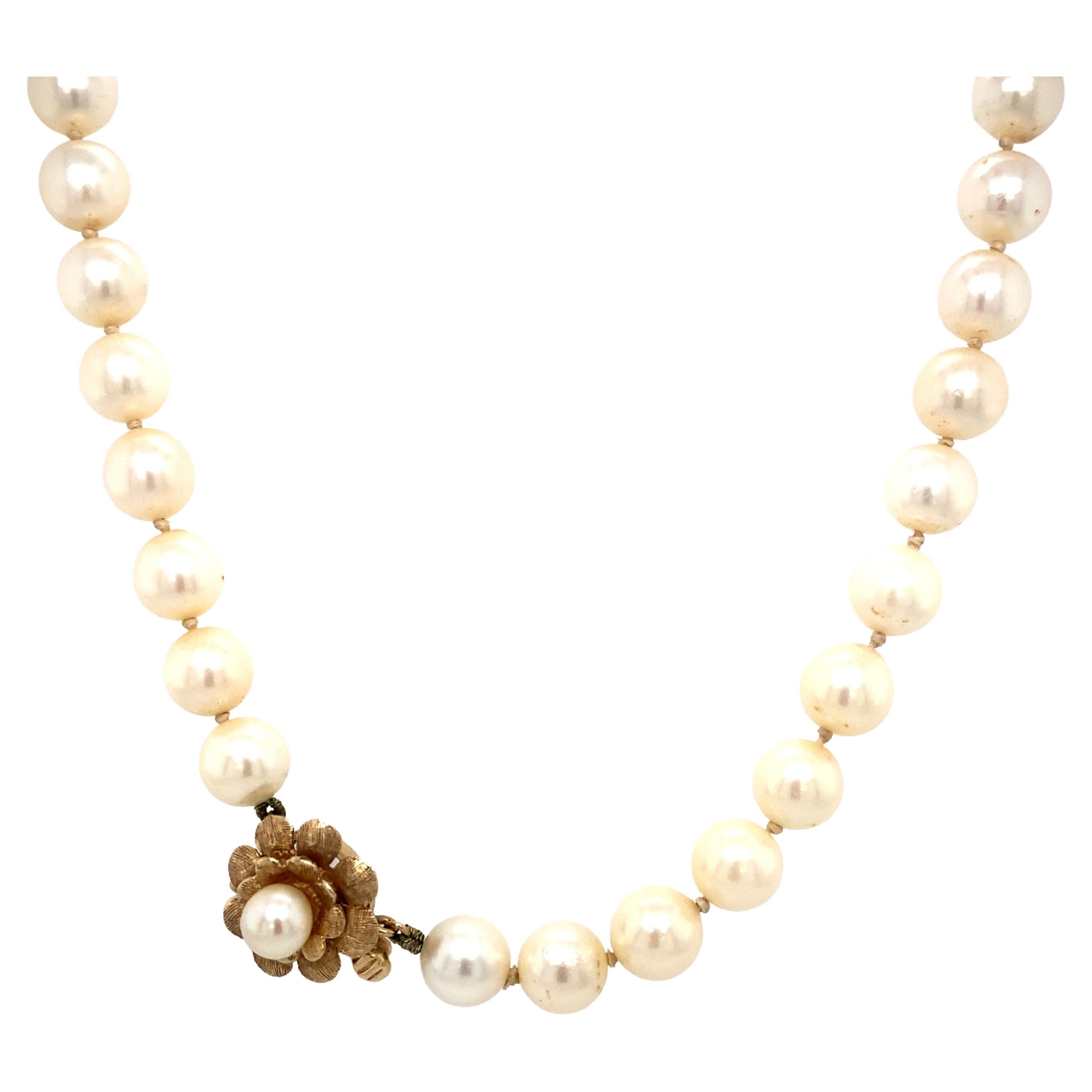 Pearl Necklace with Flower Clasp in 14 Karat Gold For Sale