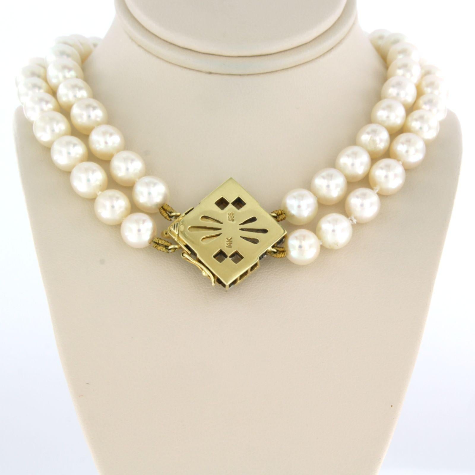 Women's or Men's Pearl Necklace with gold lock set with diamonds 14k bicolour gold For Sale