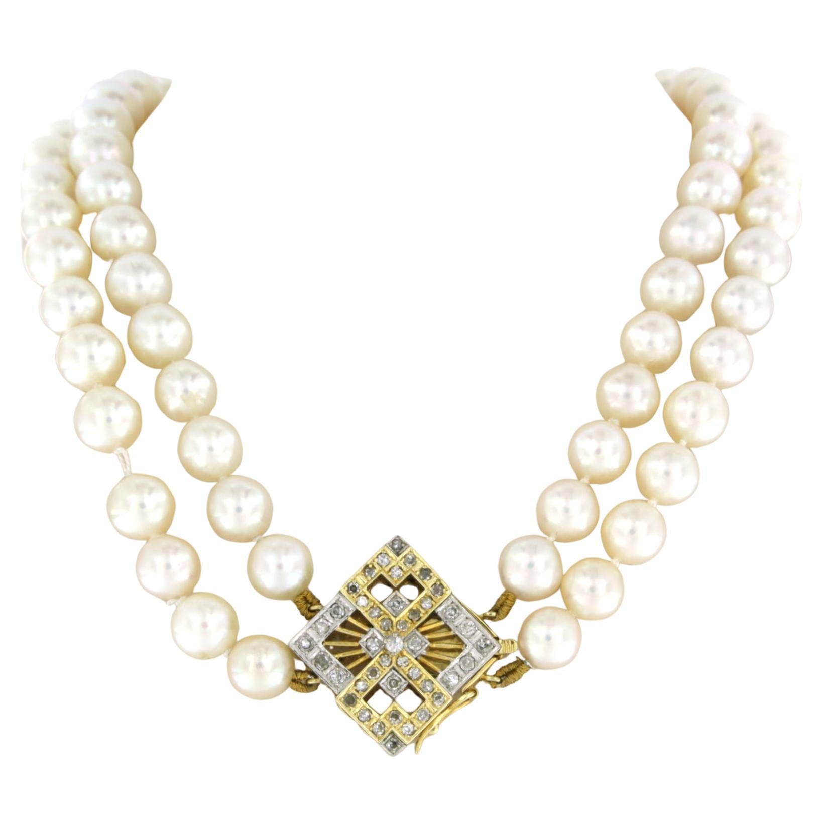 Pearl Necklace with gold lock set with diamonds 14k bicolour gold For Sale