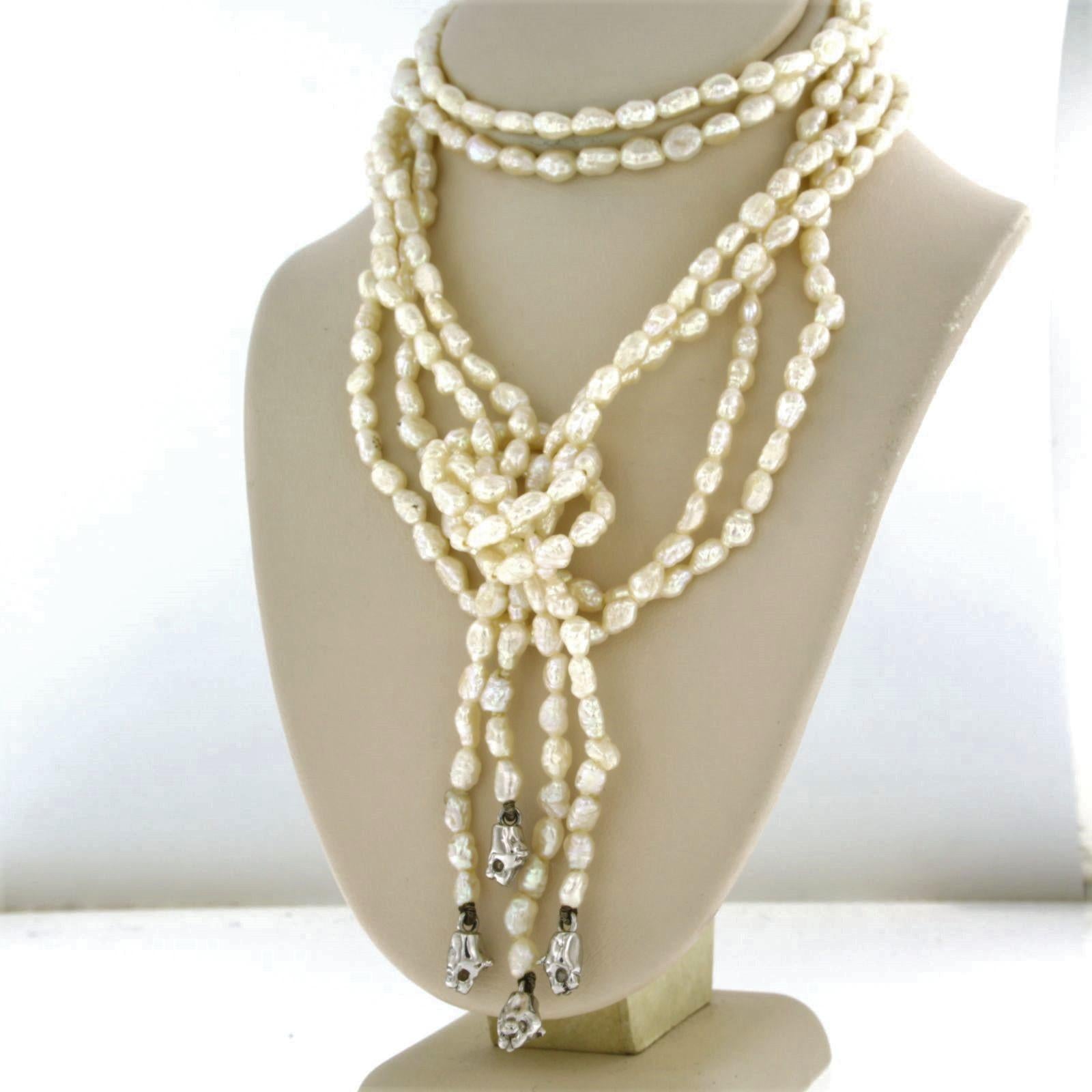 Uncut Pearl necklace with panther heads 18k white gold For Sale