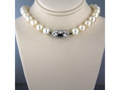 Pearl necklace with ruby and brilliant cut diamonds up to 0.80ct 18k gold