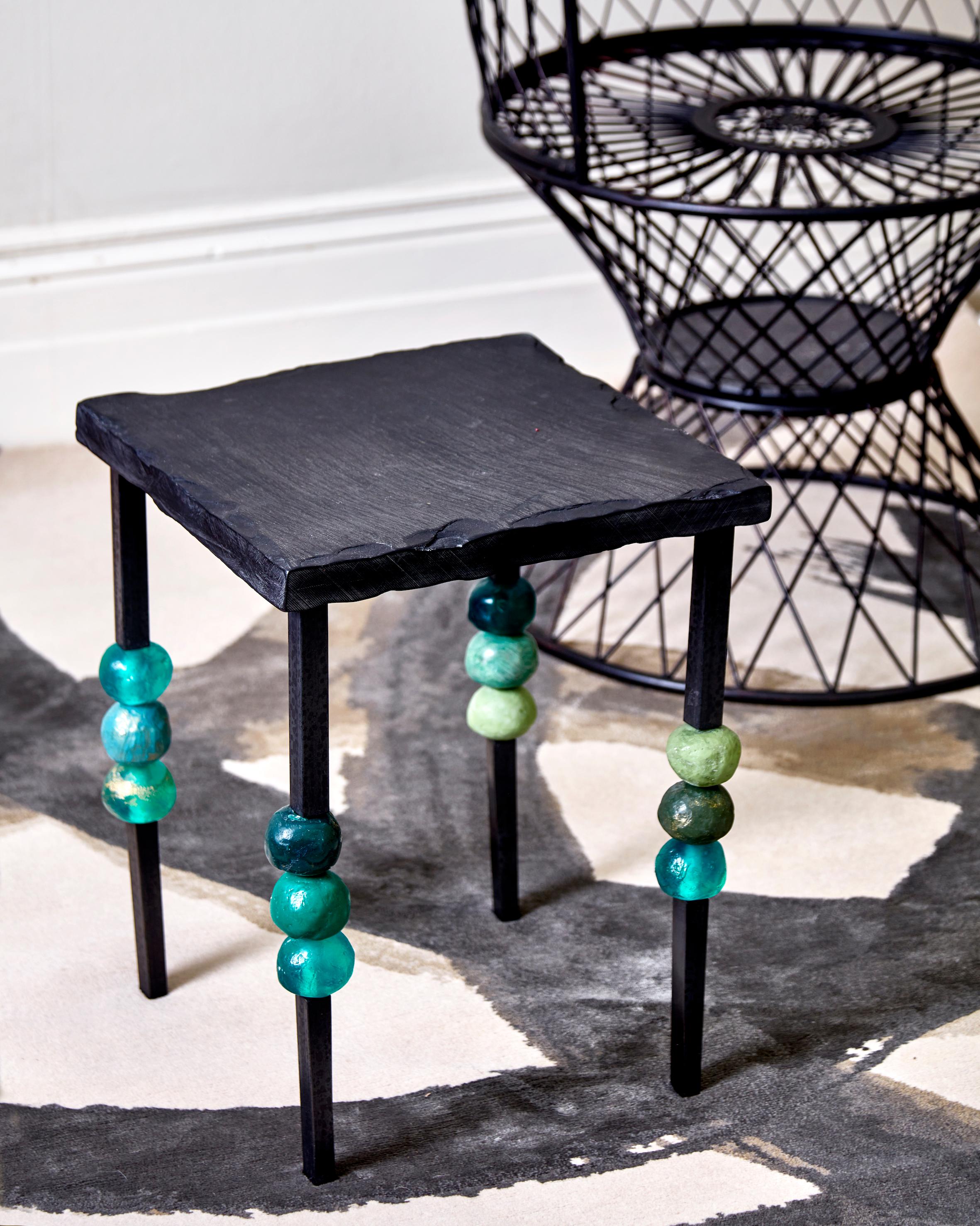Announcing a new addition to the MW functional art family with this classic occasional table enhanced with the artist’s signature resin elements epitomising her unique style.

The legs are constructed out of blackened steel whilst the top is