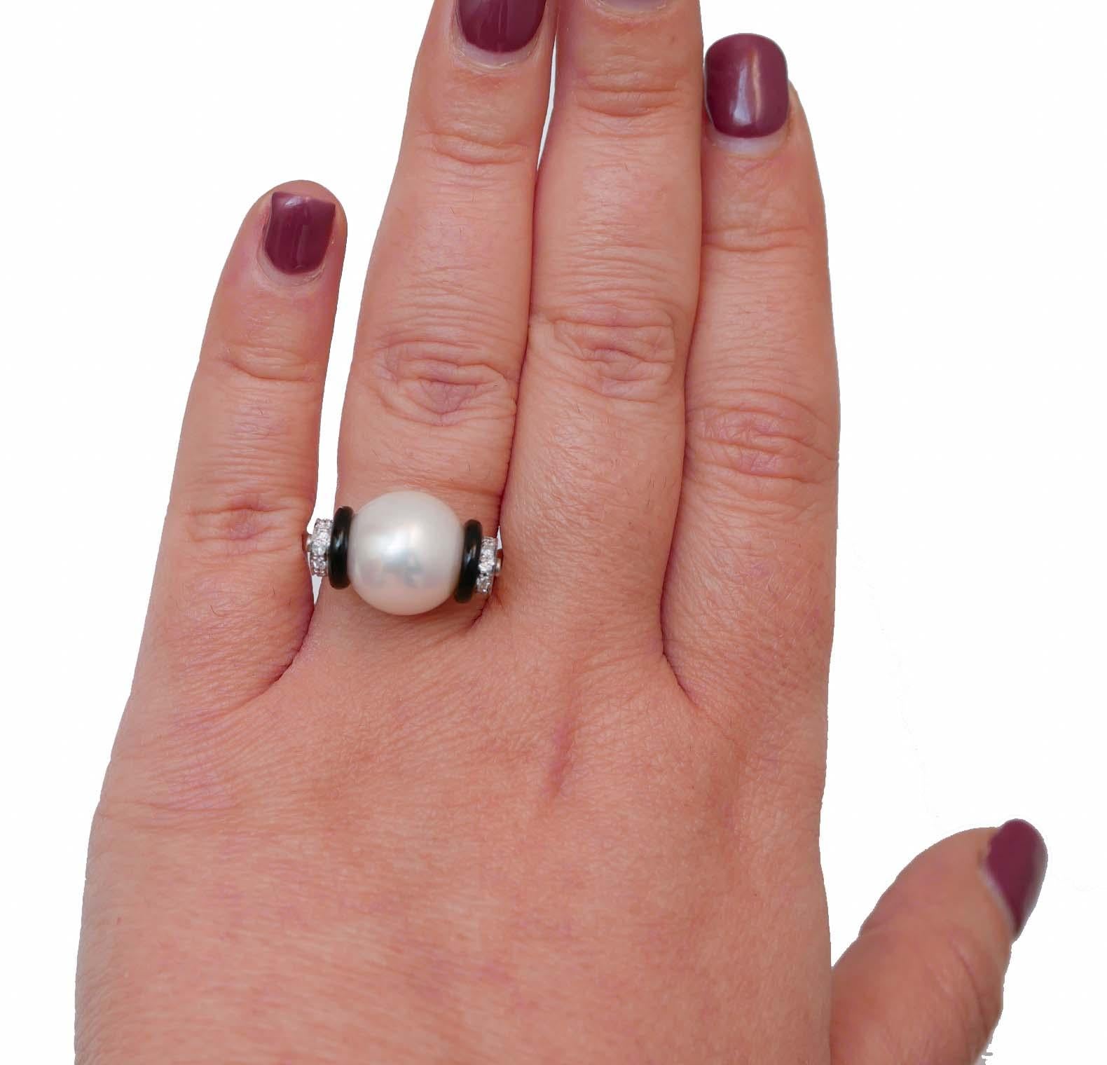 Mixed Cut Pearl, Onyx, Diamonds, Platinum Ring.