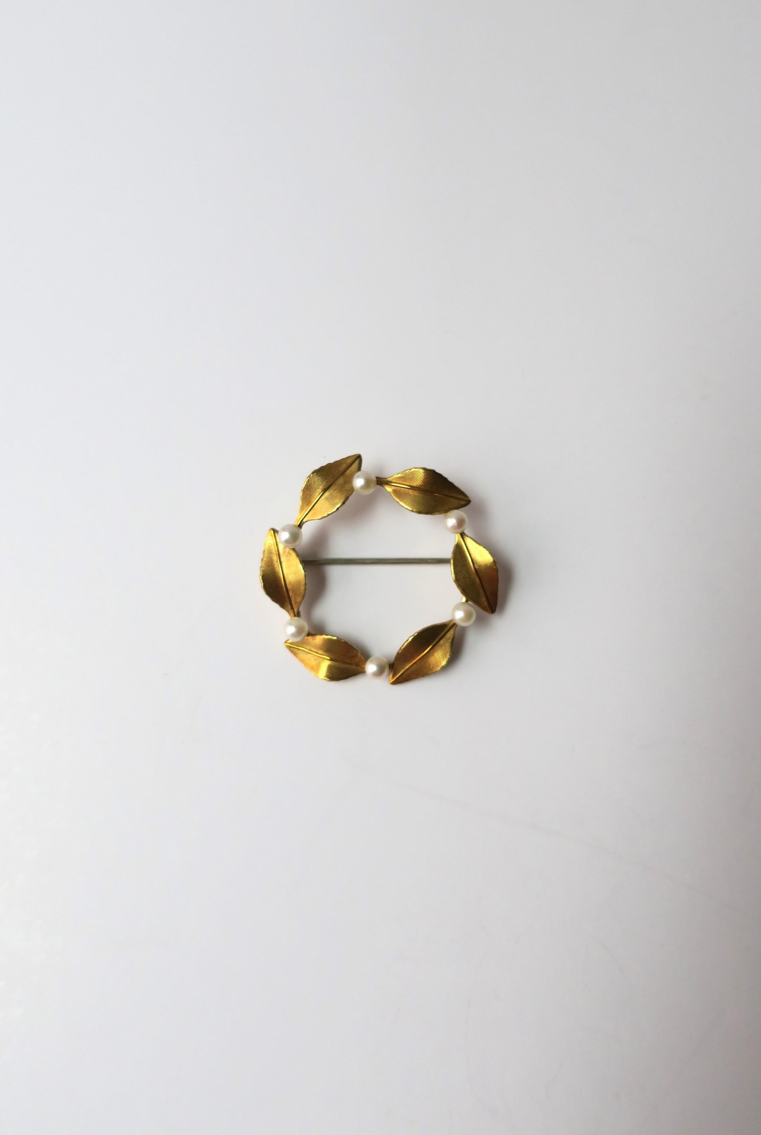 Round Cut Pearl Pin Brooch with Leaves For Sale