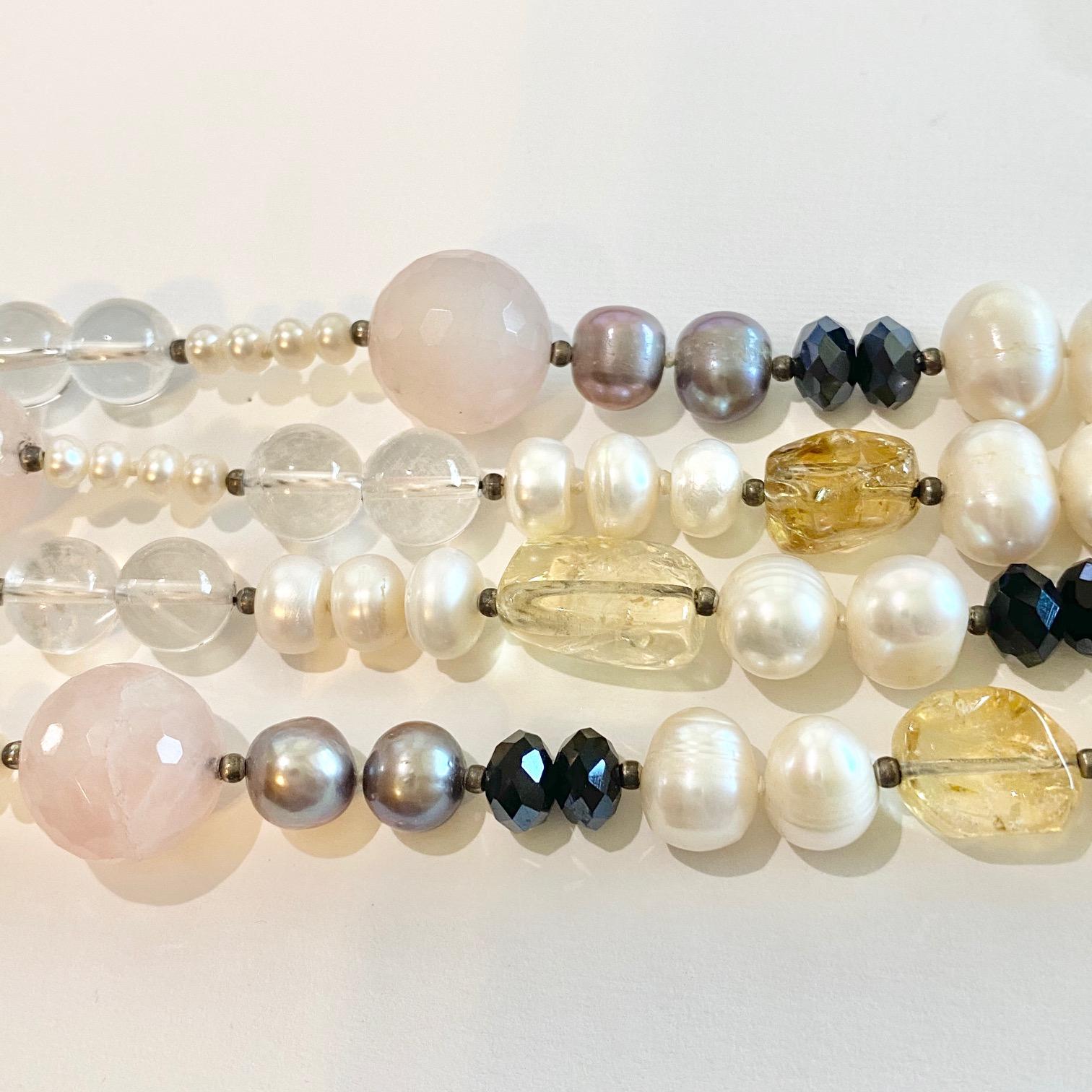 This genuine pearl and rose quartz necklace is absolutely one of a kind and gorgeous! It is made with all natural cultured pearls, rose quartz, rock crystal quartz, citrine, and black zircon and small sterling silver beads. All of the stones are