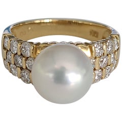 Perlenring aus 18 Karat Gold mit Diamanten