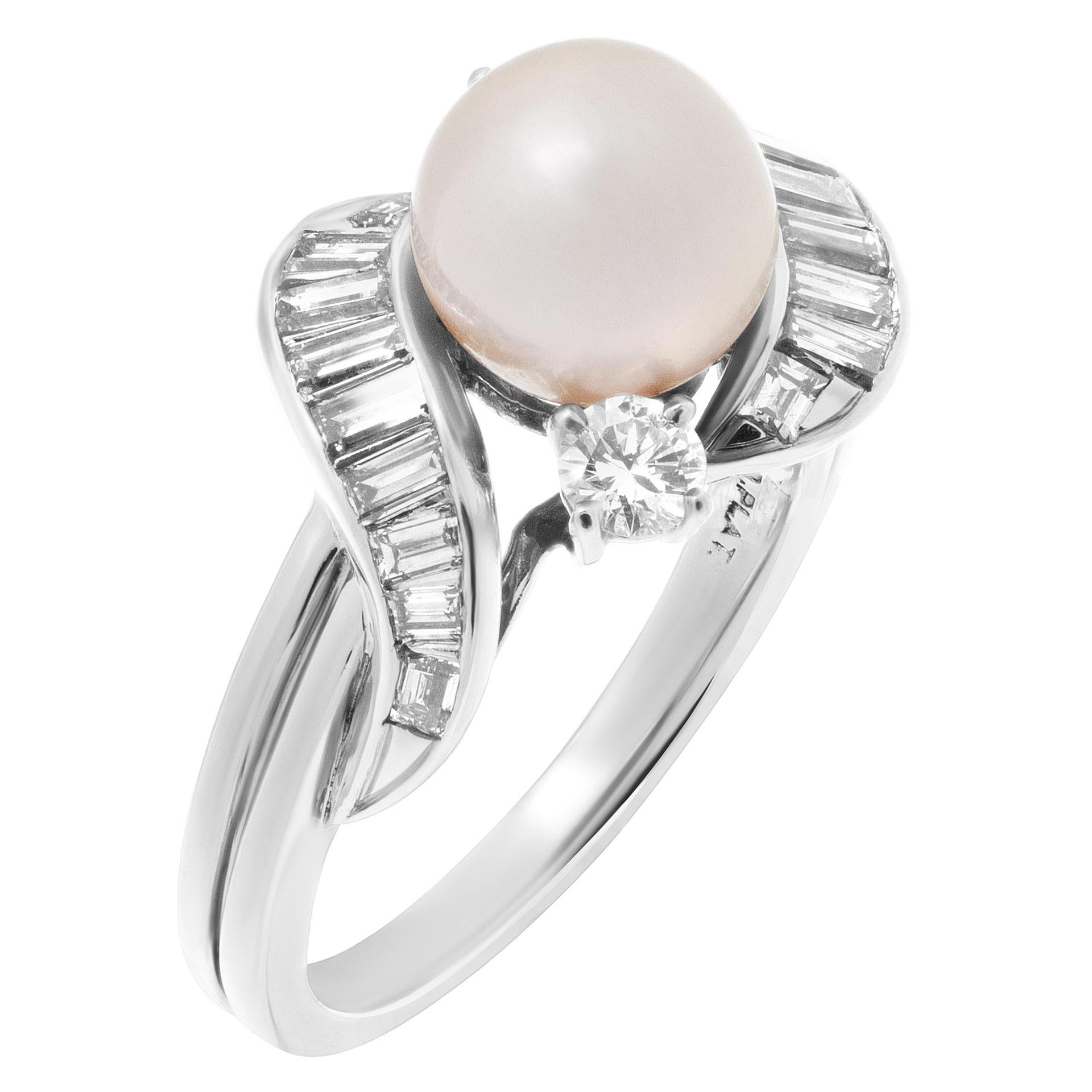 Gorgeous 7 mm pearl ring in platinum with round and baguette diamond accents approximately 0.50 carat G-H color, VS clarity. Size: 5.  This Pearl/diamond ring is currently size 5 and some items can be sized up or down, please ask! It weighs 4.8