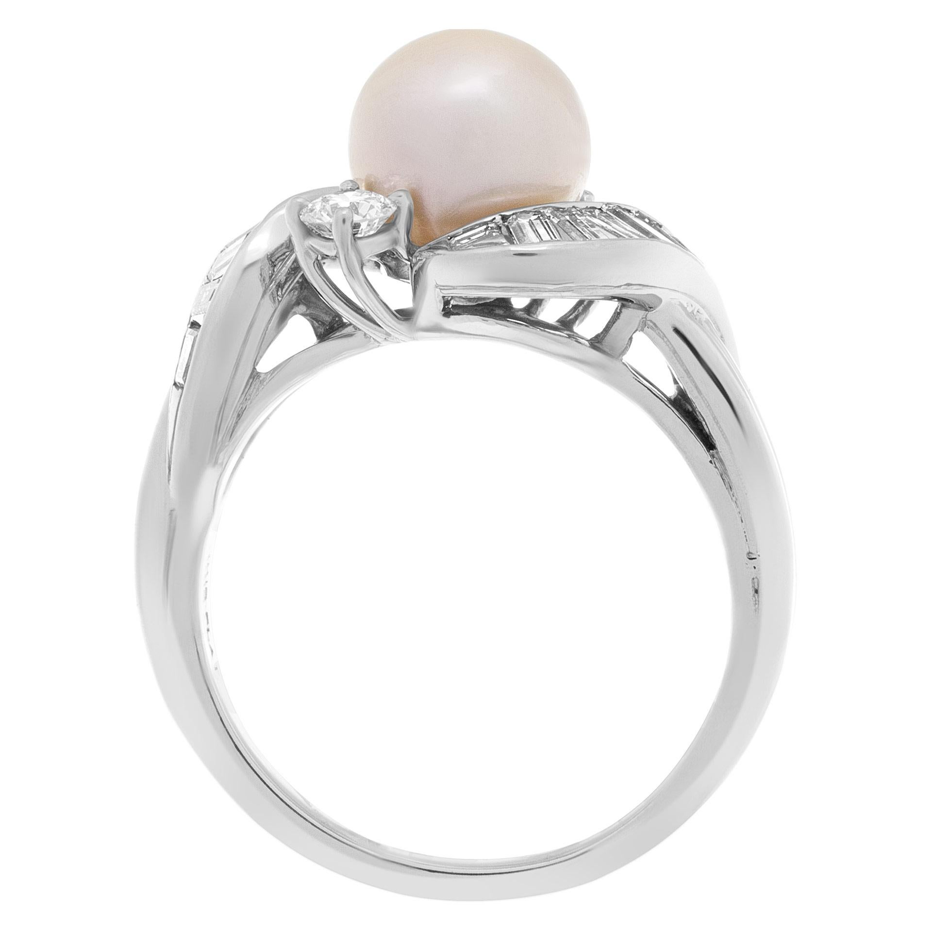 diamond engagement ring with pearl accents