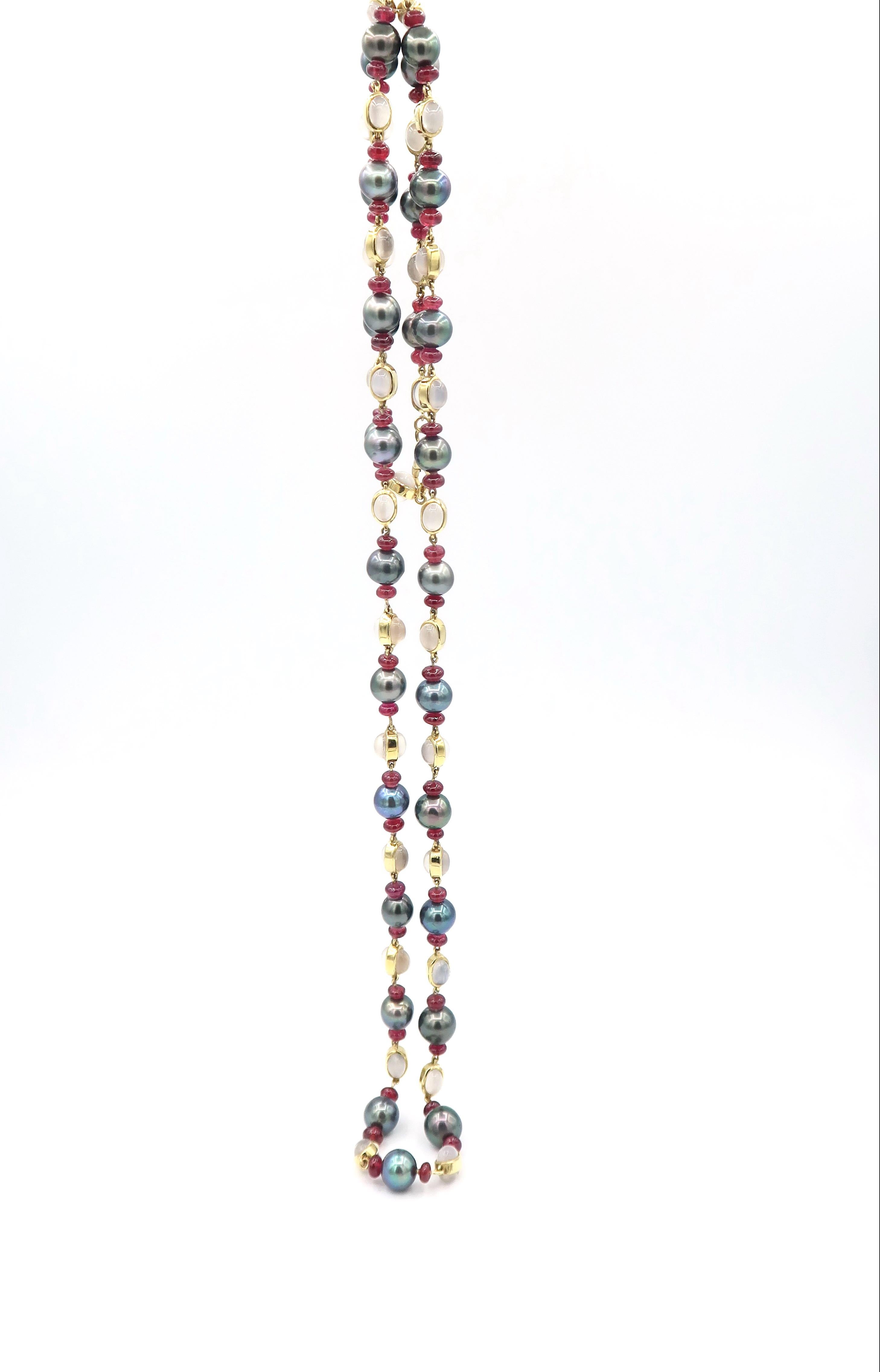 Long Strand Necklace with Pearl, Ruby, and Cabochon Moonstone set in 18K Gold Setting

Gold: 18K Yellow Gold 15.58g.
Ruby: 56cts.
Moonstone: 46.48cts.
Pearls: 28 pcs
Length: 35