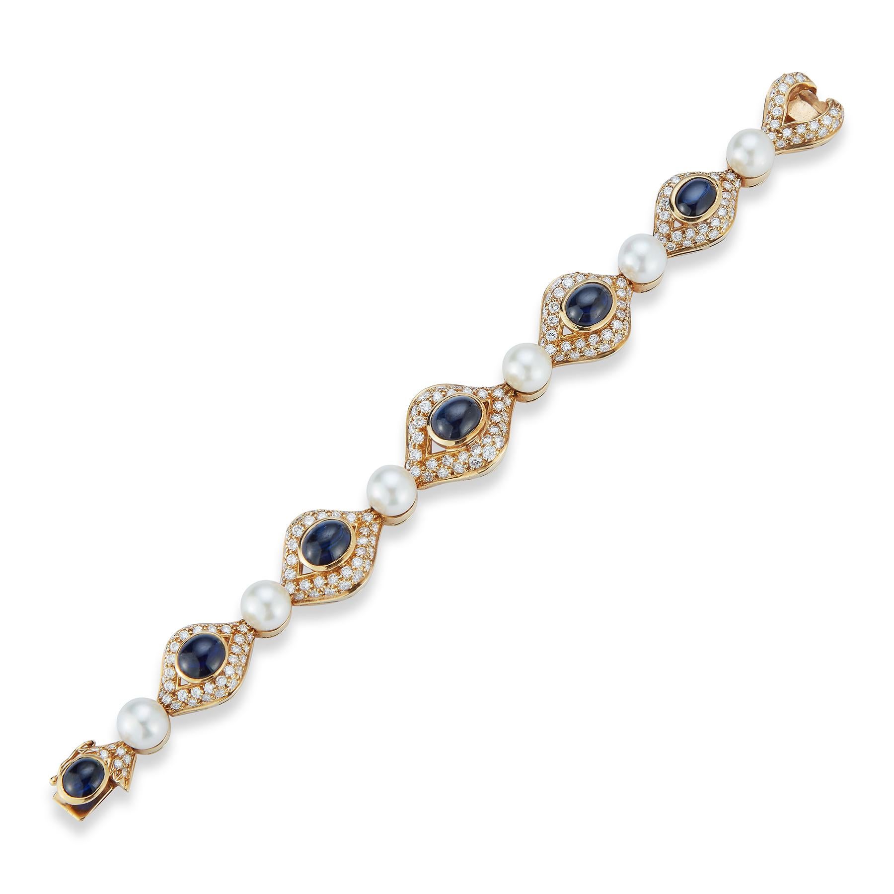 Pearl, Sapphire & Diamond Bracelet, 6 cabochon sapphires, 6 cultured pearls & pave diamonds set in 18K Yellow Gold 
Measurements: 7.5