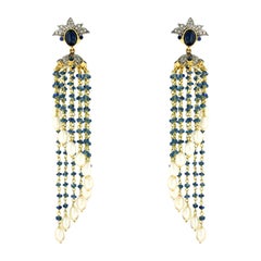 Boucles d'oreilles à pompon en perles, saphirs et diamants