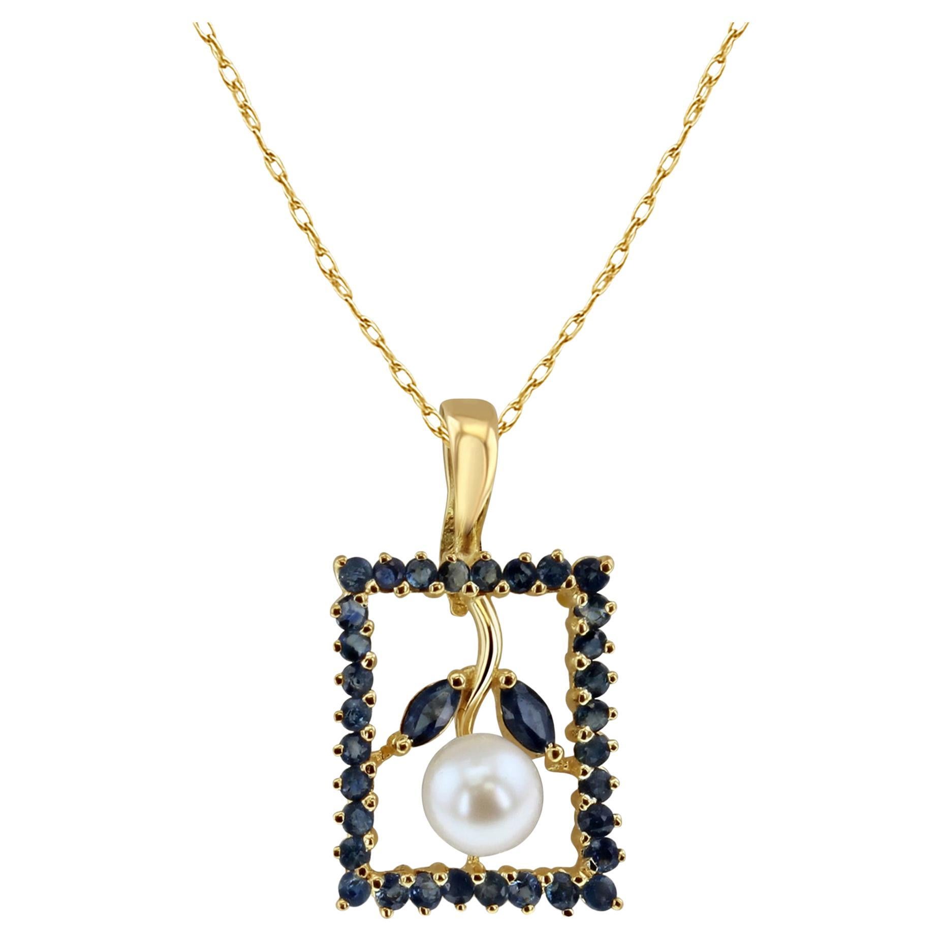 Fiore di perle e zaffiri capovolto con montatura in oro giallo 14k