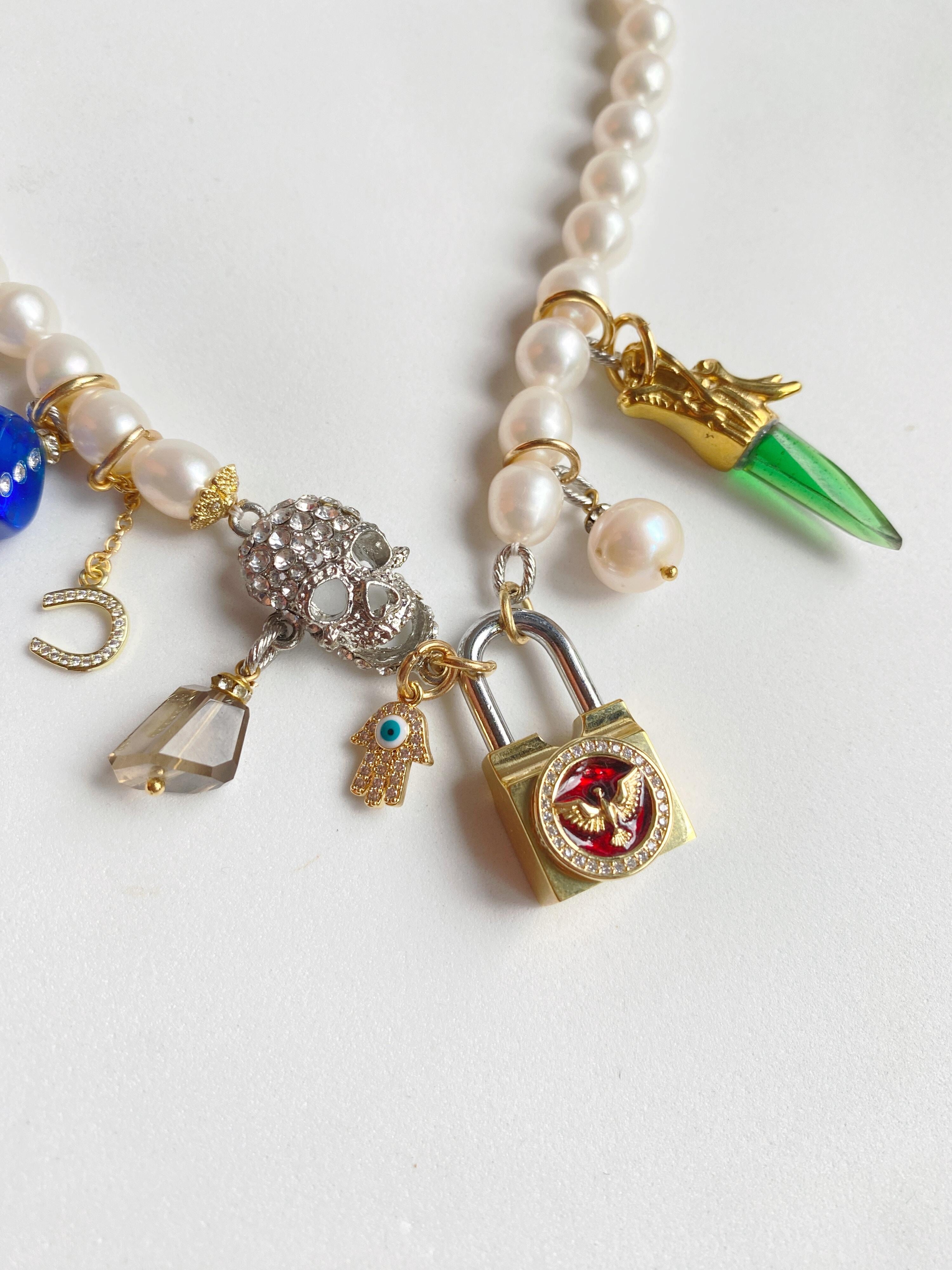 Pearl, skull and golden lock multi charm necklace For Sale 6