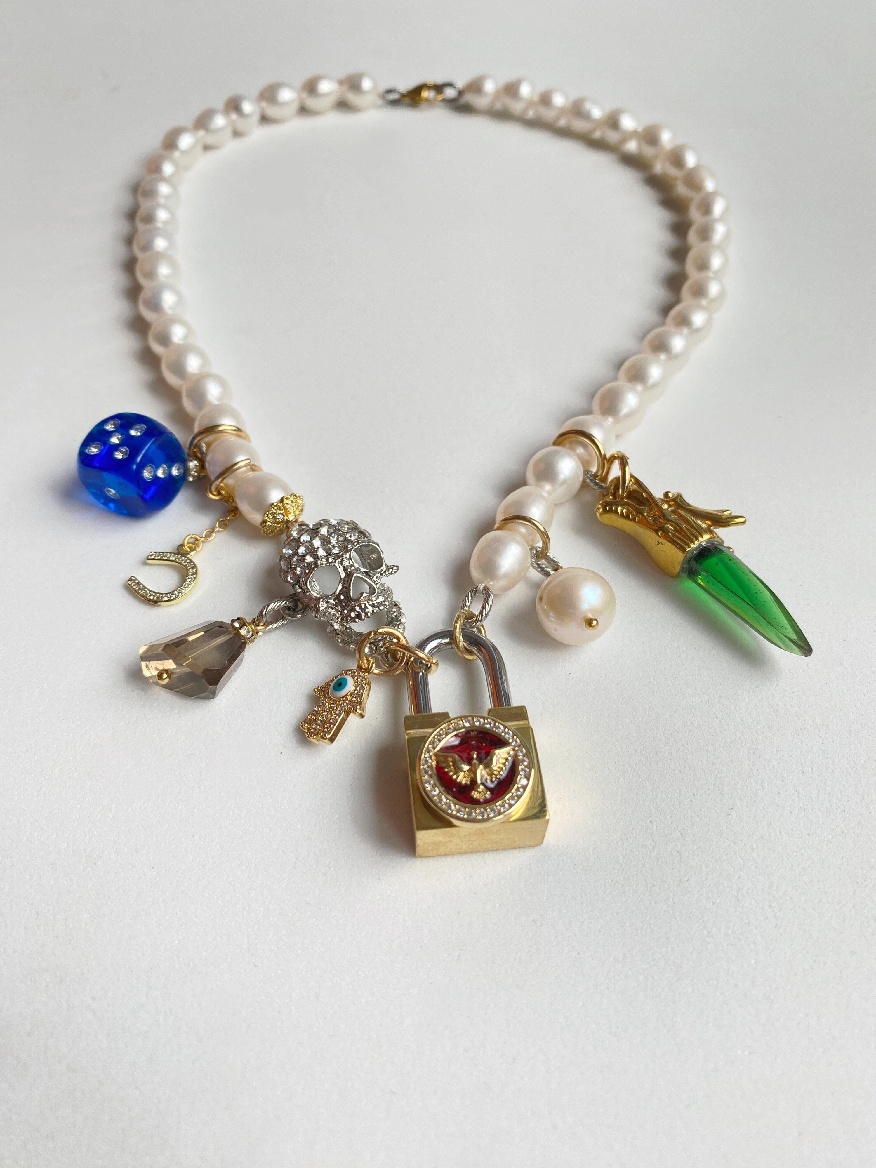 Pearl, skull and golden lock multi charm necklace For Sale 7