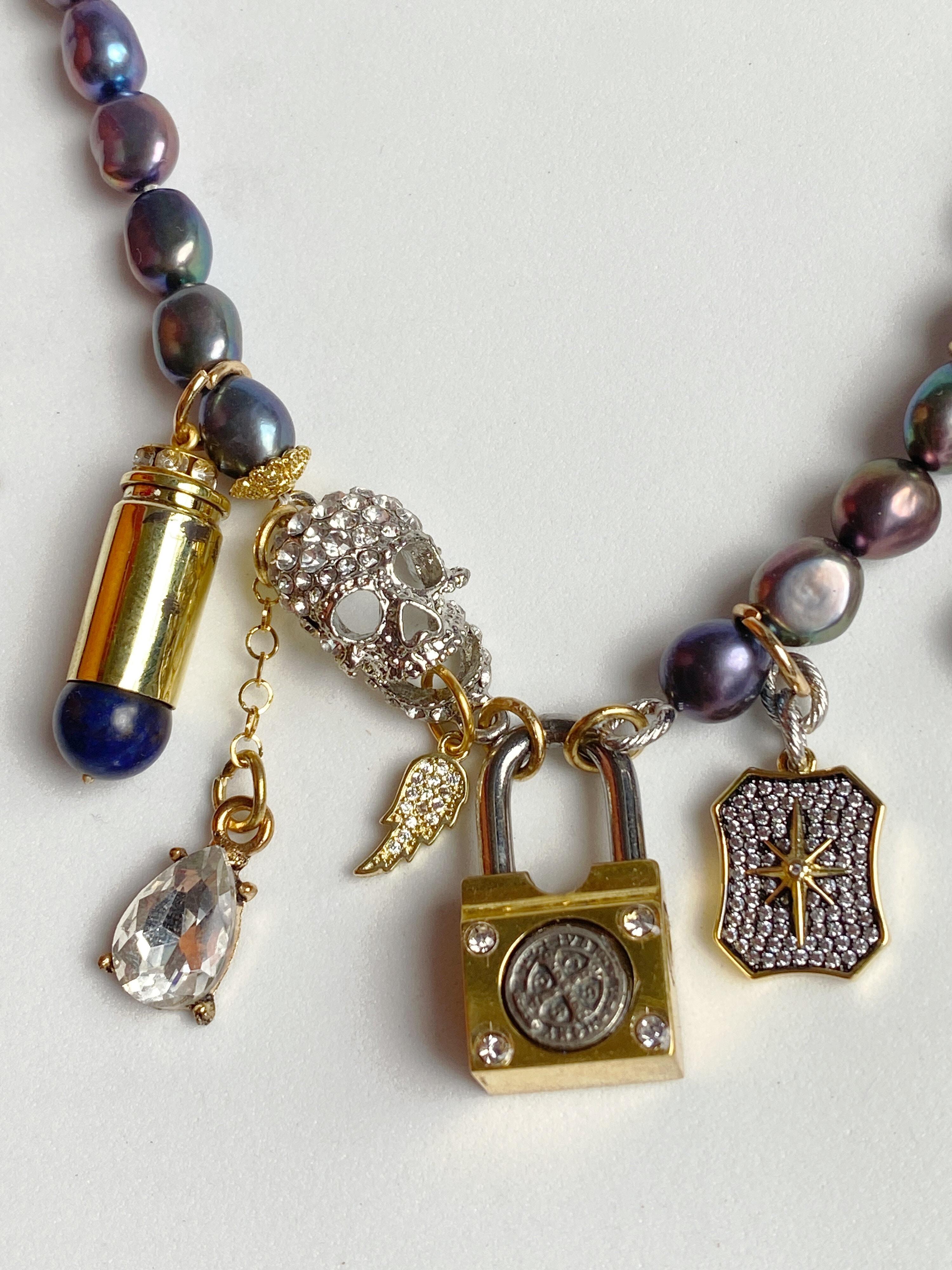 Artist Pearl, skull and golden lock multi charm necklace For Sale