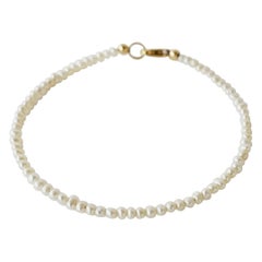 Bracciale con filo di perle in argento sterling placcato oro 14k