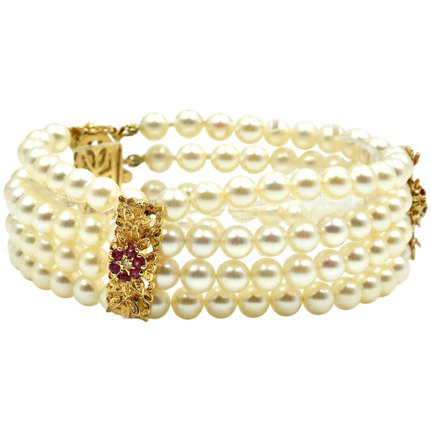 Pearl Strand Bracelet with 14 Karat Yellow Gold Ruby Stations