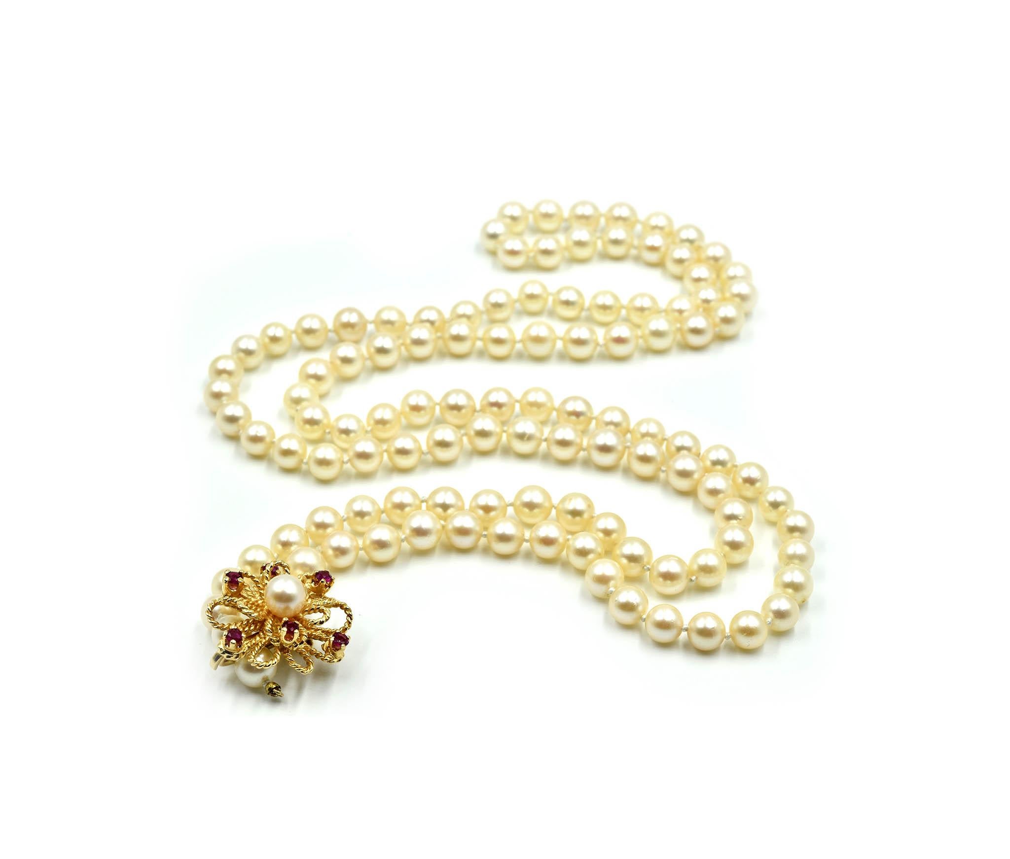 Pearl Strand Necklace with 14 Karat Yellow Gold Ruby Flower Centerpiece In Excellent Condition In Scottsdale, AZ