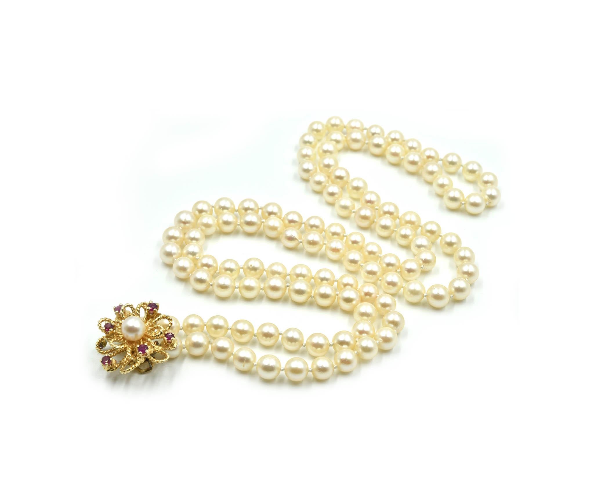 Women's Pearl Strand Necklace with 14 Karat Yellow Gold Ruby Flower Centerpiece