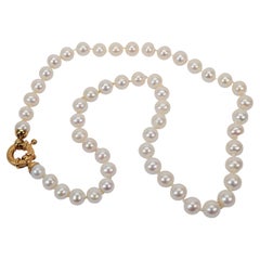 Pearl Strand Necklace with 18 Karat Yellow Gold Ornamental Clasp